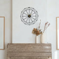 Black Metal Wall Clock – Timeless Elegance for Every Space