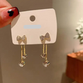 Crystal Drop Bow Earrings – Dainty Gold Danglers with Sparkling Charm