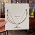 Elegant Dual Chain Necklace – White Heart Charm