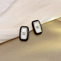 Elegant Rectangular Pearl Studs – Black Border with Center Gem