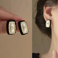 Elegant Rectangular Pearl Studs – Black Border with Center Gem