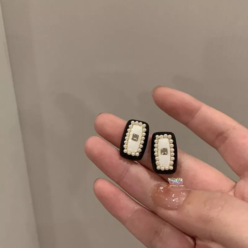 Elegant Rectangular Pearl Studs – Black Border with Center Gem