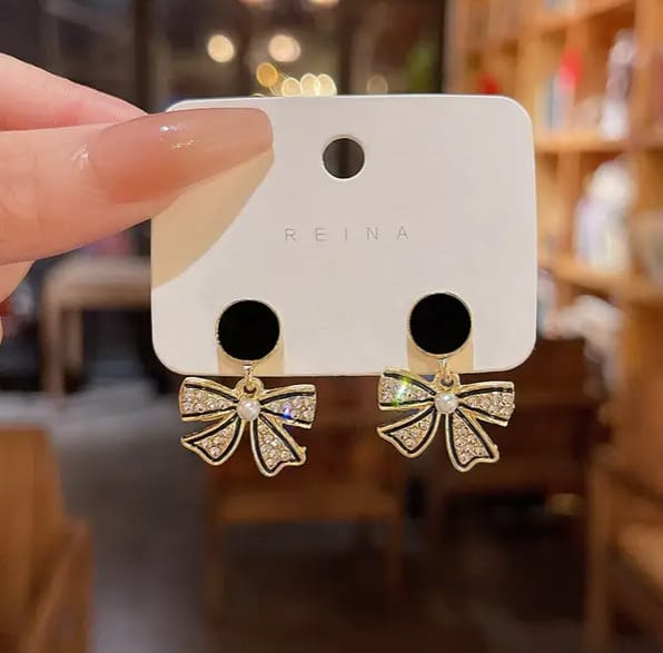 Golden Bow Earrings with Black Stud Top – Sparkle & Grace