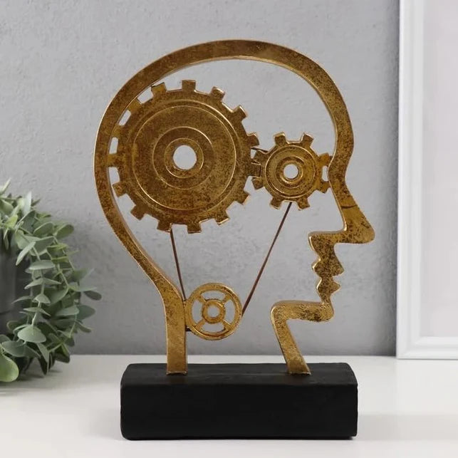 Man with Gear in the Head Statue – A Symbol of Creativity and Innovation