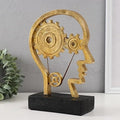 Man with Gear in the Head Statue – A Symbol of Creativity and Innovation