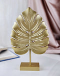 Monstera Leaf Shape Golden MDF Partical Board Showpiece – Elegant & Modern Home Decor
