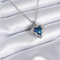 Ocean Blue Crystal Heart Necklace – Dive into Elegance with Faux Silver Shine