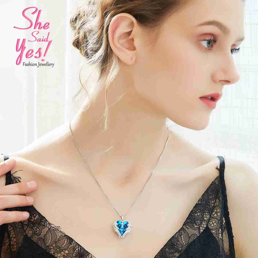 Ocean Blue Crystal Heart Necklace – Dive into Elegance with Faux Silver Shine
