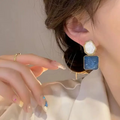Ocean Ripple Dual-Tone Enamel Earrings – Elegant Blue & Ivory Studs with Gold Trim