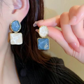 Ocean Ripple Dual-Tone Enamel Earrings – Elegant Blue & Ivory Studs with Gold Trim