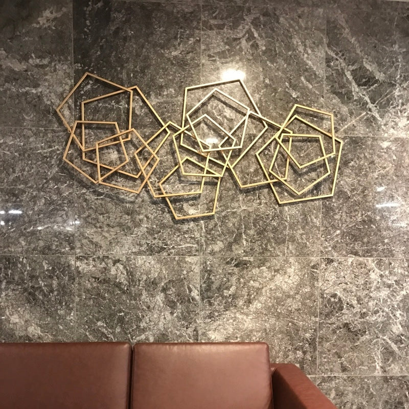 Pentagon Gold Metal Wall Art – A Bold Statement of Luxury and Elegance