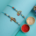 Peacock and Flute Rakhis, top