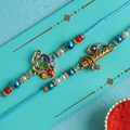 Peacock and Flute Rakhis, front