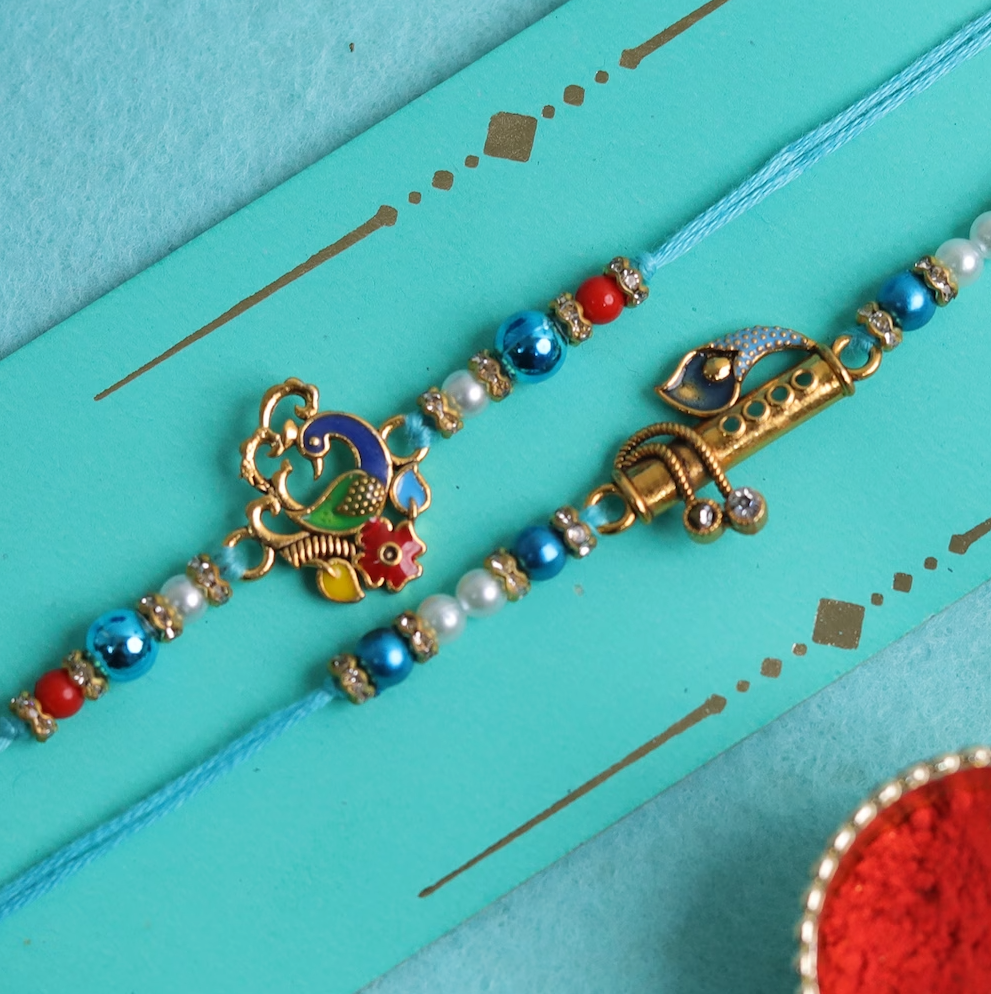 Peacock and Flute Rakhis, front