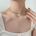 Silver-Tone Bow Charm Necklace – A Touch of Grace with an Elegant Layered Look