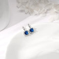 Silver Sapphire Blue Halo Earrings – A Celestial Glow in Pure 925 Silver