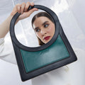The Aureola Shoulder Bag – Emerald Green & Onyx Black – A Bold Blend of Luxury and Style
