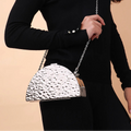 The Dented Curve Clutch Bag – California Gold – A Bold Twist on Timeless Glamour