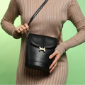 The Monogram Sling Bag – Midnight Black – A Chic Fusion of Elegance and Function